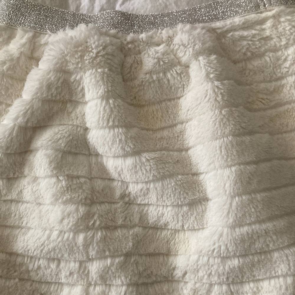 Glitter band, furry skirt